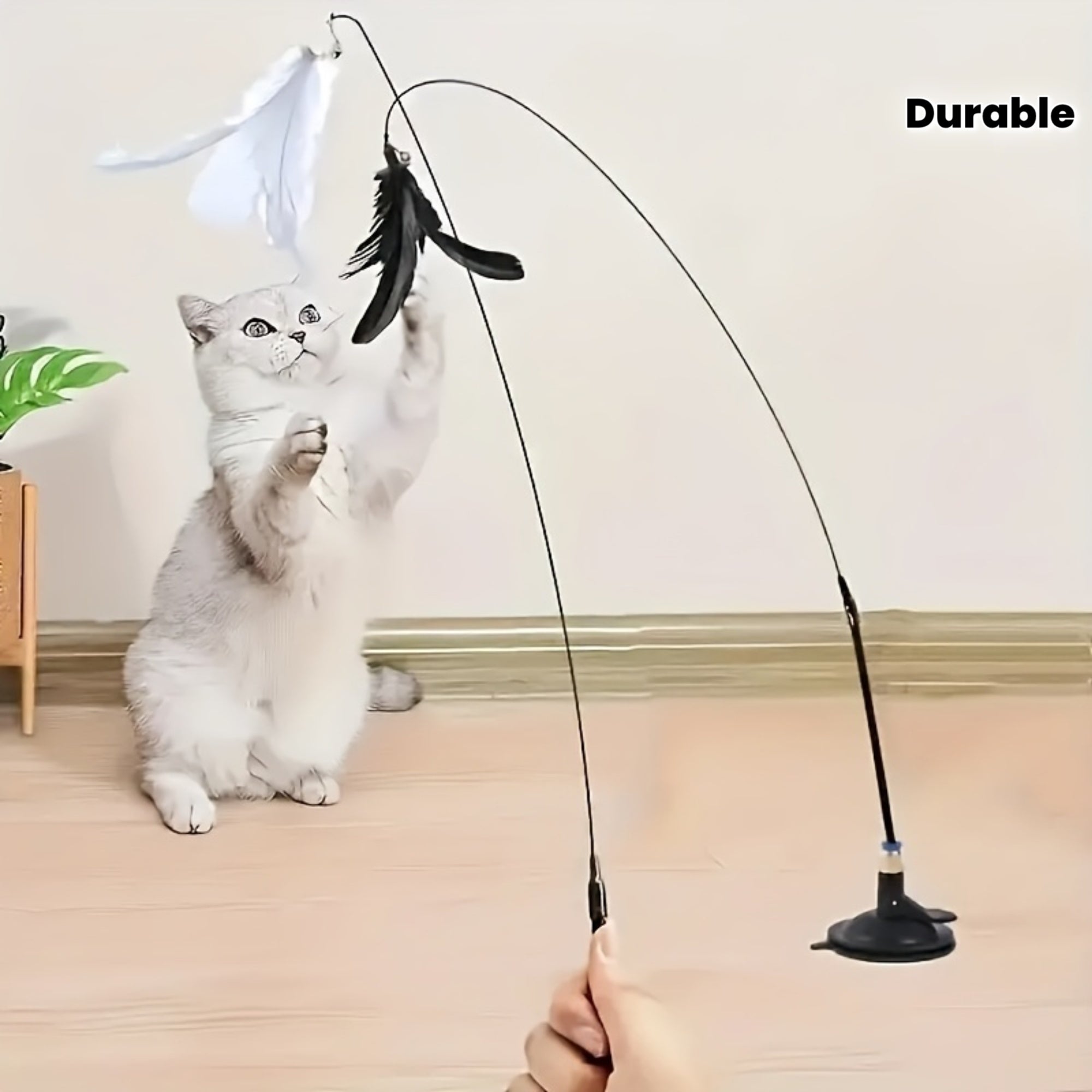 A Playful Cat Accessory Featuring Feathers, Designed with Both Artificial And Realistic Options, a Sturdy Long Stick with a Durable Wire, And a Suction Cup Base. It Operates Without Batteries And Is Perfect for Entertaining Small Dogs And Providing